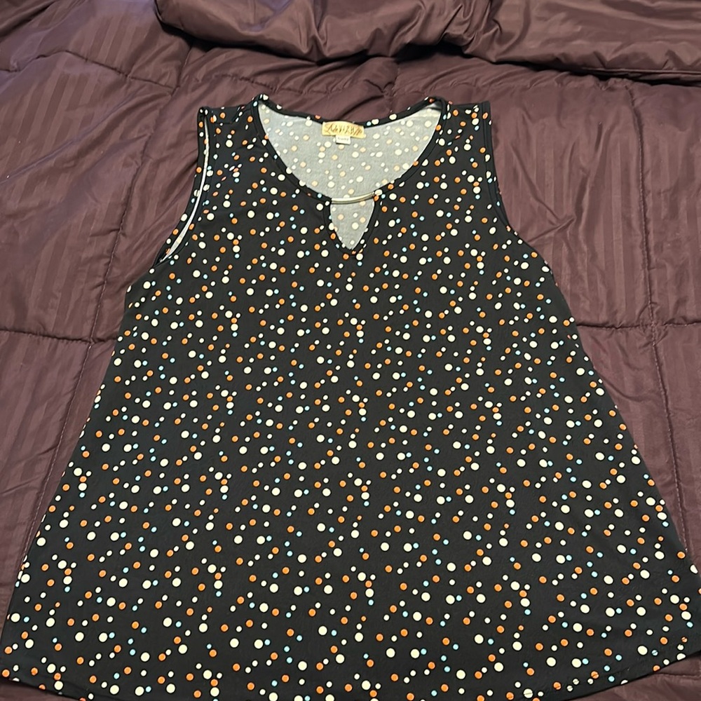 Sleeveless fun summer top casual or business appropriate